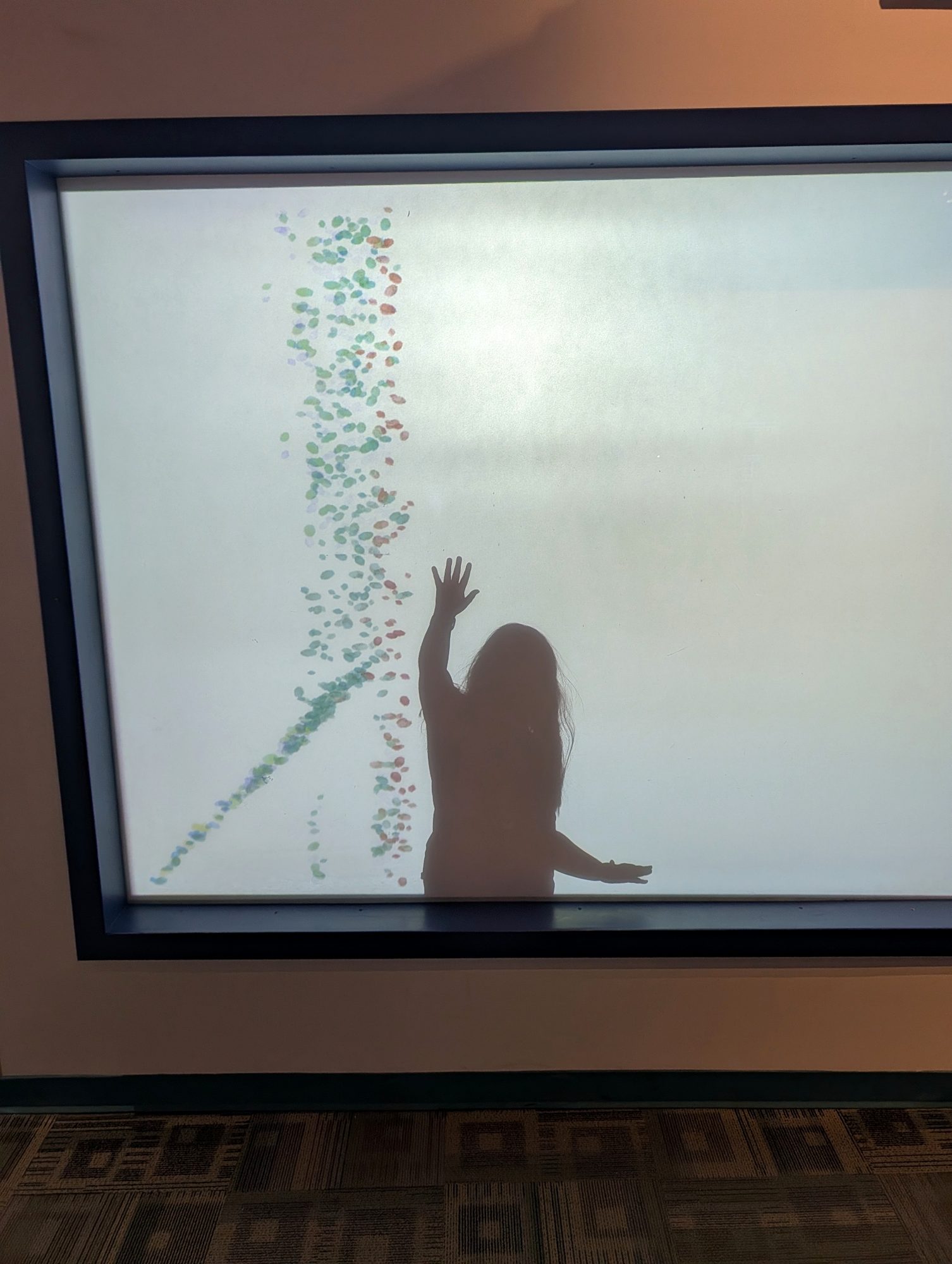 Shadow on the glowing wall